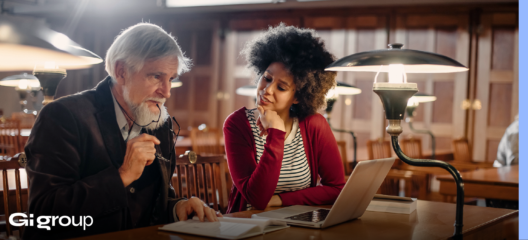 Employees from different generations collaborating in a multigenerational workplace